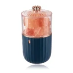 Stylish salt and pepper grinder set with rose gold top and blue base, perfect for modern kitchens and dining tables.