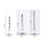 Decorative glass pen with a twisted design, measuring 23-29 cm in height and 7 cm in width, ideal for writing or as a desk ornament.