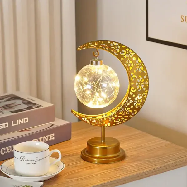 Decorative celestial moon and star LED lamp with intricate gold design, perfect for science-themed decor and educational spaces.