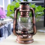 Antique copper lantern with glass enclosure, ideal for science-themed decor and educational displays. Perfect for adding a vintage touch to science classrooms or laboratories.
