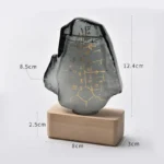 Ancient Egyptian-inspired glass sculpture with hieroglyphics on a wooden base, measuring 12.4 cm tall and 8.5 cm wide, perfect for science-themed decor and educational displays.