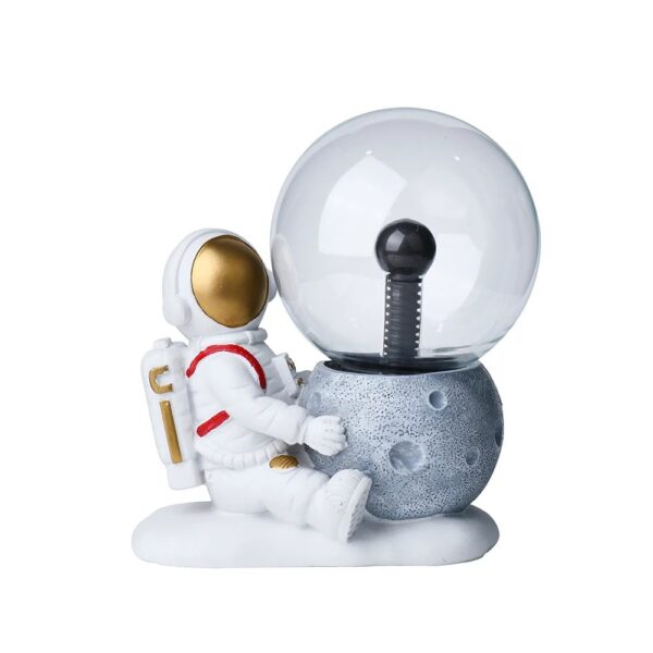 Astronaut and Moon Lamp Decor for Science Enthusiasts.