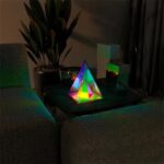 LED Light Pyramid with Colorful Geometric Design.