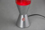 Modern ultrasonic essential oil diffuser with a sleek silver base and red top, designed for aromatherapy and relaxation.