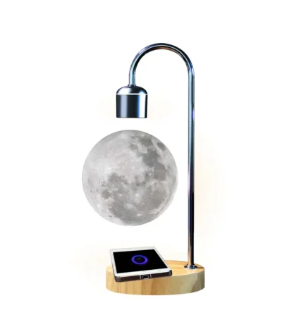 Moon-shaped desk lamp with adjustable metal arm, wireless charging pad, and wooden base, ideal for science-themed decor and educational purposes.