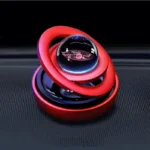 Innovative science gadget with a glass sphere, red rings, and a sleek black base, perfect for science enthusiasts and educational displays.