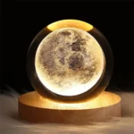 Illuminated moon globe lamp with detailed lunar surface, mounted on a wooden base, perfect for science decor and educational settings.