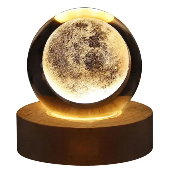 Moon globe lamp with a realistic lunar surface design, illuminated on a wooden base, creating a cozy and educational decorative piece.