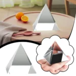Reflective mirror pyramid toy demonstrating optical illusion and geometric reflection for educational and decorative purposes.