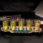 Holographic digital number display with glowing yellow lights, showcasing a futuristic and educational science gadget. Perfect for science enthusiasts and educational displays.