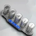 A clear plastic test tube rack with six slots of varying sizes, designed for organizing and holding test tubes securely in laboratory settings.