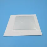 Mirror with White Frame on Blue Background.