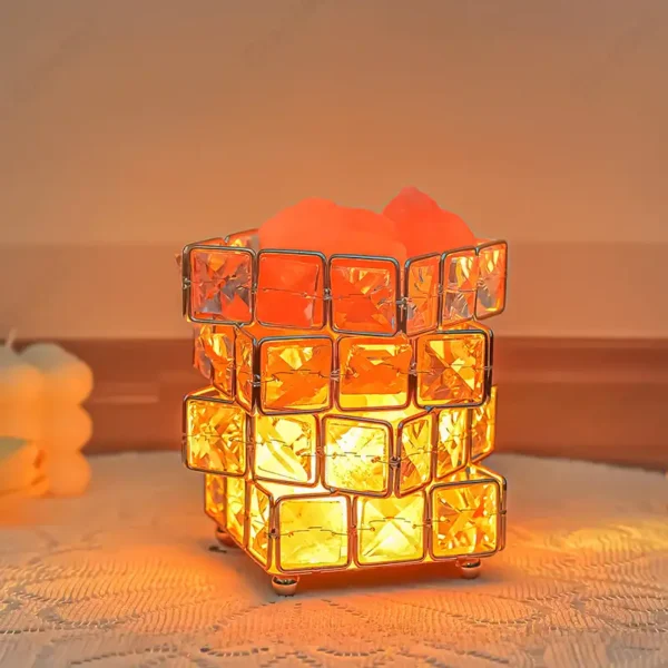 Bright orange lava lamp with glass cubes and bubbling wax inside, creating a mesmerizing glow. Perfect for science-themed decor and educational purposes.