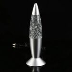 Modern lava lamp with silver base and glitter-filled glass, creating a sparkling visual effect, perfect for science decor and educational spaces.