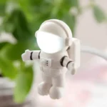 Adorable mini astronaut night light with LED face, perfect for kids' rooms, educational spaces, or as a unique decor piece inspired by space exploration.