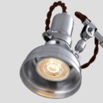 Industrial-style LED spotlight with adjustable arm and twisted brown cord.