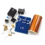 Collection of electronic components including a blue circuit board, resistors, capacitors, a relay, and a battery for science experiments and educational projects.