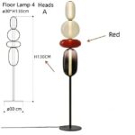 Elegant multi-head floor lamp with four colorful glass globes in white, red, and black, standing 130 cm tall, perfect for contemporary home decor.
