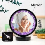 Decorative mirror with purple crystal accents, perfect for beauty routines and home decor.