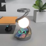 Wireless charging lamp with integrated light bulb for desk illumination and device charging.