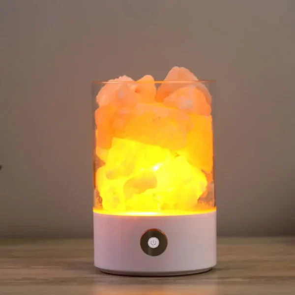 Himalayan salt lamp with a misting feature, emitting a warm glow and creating a calming atmosphere, perfect for home decor and relaxation.