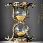 A decorative snake-shaped hourglass with gold accents, featuring detailed snake figures wrapping around the glass bulbs, perfect for science decor and educational displays.