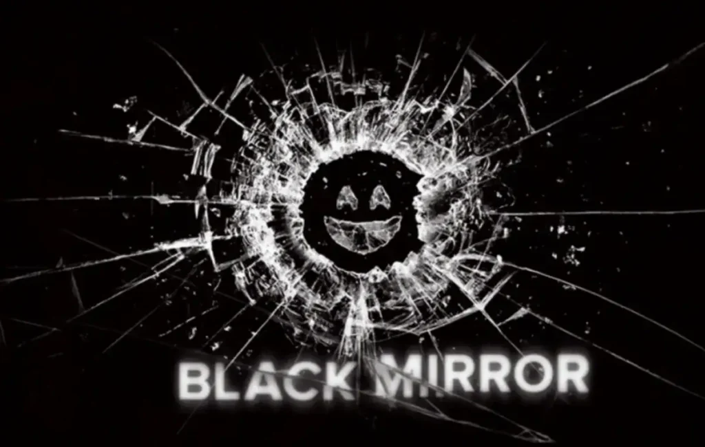 A black mirror with a cracked surface featuring a smiling face, resembling a broken reflective surface, with the text "BLACK MIRROR" below.