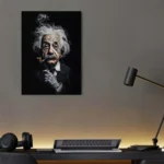 Artistic print of Albert Einstein with wild hair and thoughtful expression, displayed on a modern wall with desk accessories.