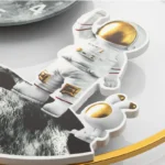 Space-themed astronaut puzzle toy with a white suit and gold accents, designed for educational play and decoration. Perfect for science enthusiasts and young explorers.