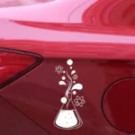 Creative science-themed car decal featuring a laboratory flask with floating atomic and molecular symbols, perfect for science enthusiasts.
