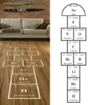 Educational floor diagram showing the periodic table with hydrogen at the bottom and neon at the top, designed for science decor and learning.