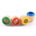 Wooden ring toss game featuring four colorful rings in green, red, yellow, and blue, designed for children's educational and recreational activities.