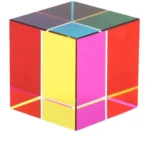Bright neon-lit Rubik's Cube with colorful panels, ideal for science-themed decor and educational toys.
