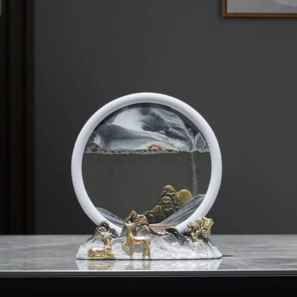 A decorative water fountain with a circular mirror and metallic animal figurines on a sleek surface.
