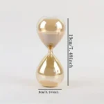 Glass hourglass timer measuring 19 cm (7.48 inches) in height and 8 cm (3.14 inches) in diameter, ideal for science experiments, educational activities, and decorative purposes.