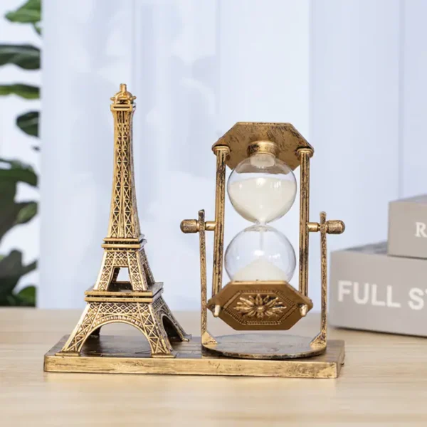 Decorative Eiffel Tower and vintage-style hourglass on wooden base, ideal for science decor and educational display.