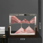 A decorative glass art piece featuring a mountain reflection design, measuring 19cm by 14.2cm, perfect for science-themed decor and educational settings.