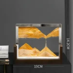 Sand dunes miniature in a glass frame, showcasing layered textures and natural colors, perfect for science decor and educational purposes.