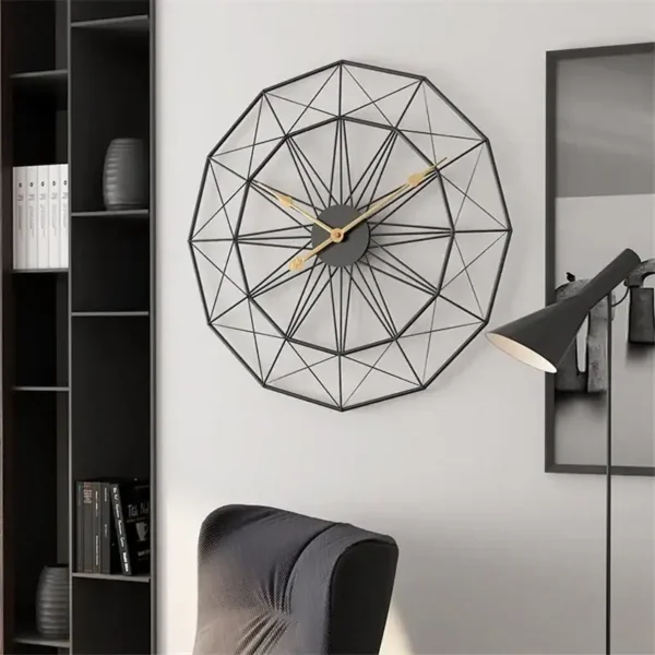 Stylish geometric wall clock with black wireframe design and gold hands, perfect for contemporary home decor.