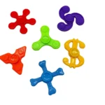 Brightly colored fidget spinners including red, green, purple, yellow, orange, and blue, designed for stress relief, focus, and sensory play. Perfect educational toy for children and adults.