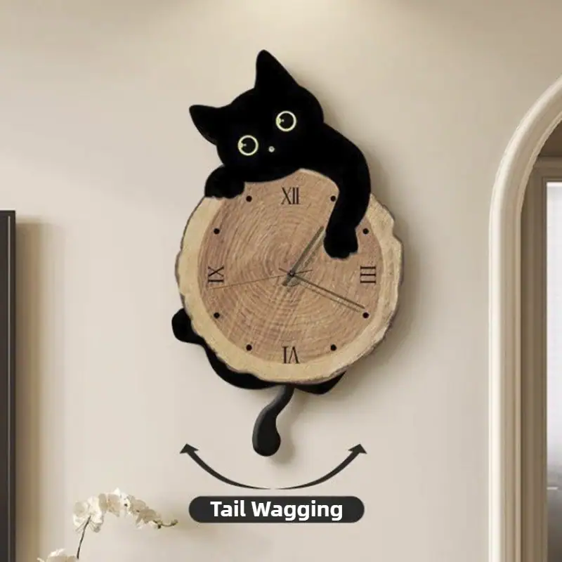 Cute black cat-shaped wall clock with a tail wagging design, perfect for cat lovers and home decor enthusiasts. Adds playful charm to any room with its whimsical style and functional timekeeping. Original Cat Pendulum Wall Clock - Image 1