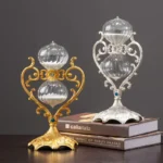 Exquisite glass and metal decorative vases with intricate designs, perfect for enhancing your home decor with a vintage touch. These ornamental pieces combine craftsmanship and elegance, ideal for dis.