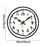 Stylish black-framed wall clock featuring a clear white dial with bold black numbers and hands, perfect for home or office decor.