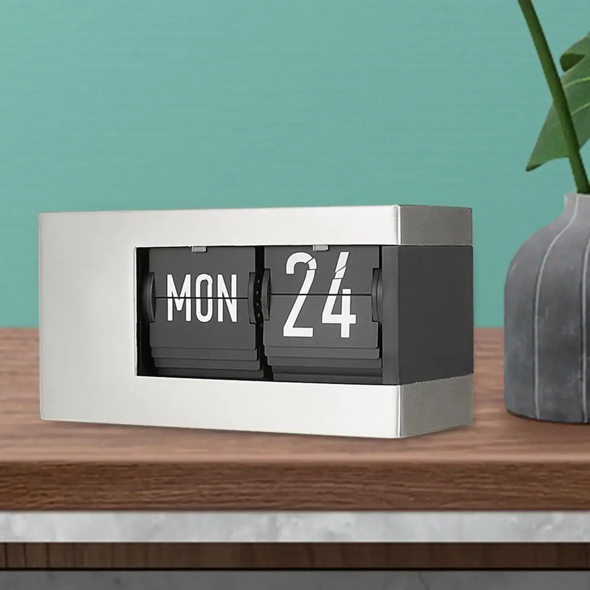 Flip Calendar Desk Clock Flip calendar desk clock showing Monday, 24th.
