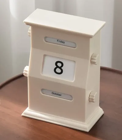 Vintage-style calendar flip clock displaying October 8, perfect for science decor and educational spaces.