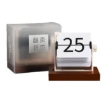 Wooden flip calendar showing the date "25" with a silver box and white number cards, ideal for desk or home decor.