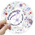 Hand holding a neurobiologist sticker with the phrase "Neurobiologists have a lot of nerves" featuring a neuron illustration, on a blurred background of neuroscience-themed stickers.