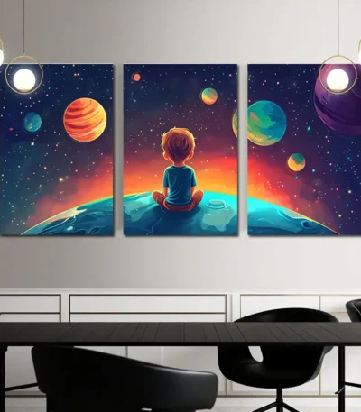 Young child sitting on a colorful space-themed canvas triptych artwork, depicting planets and stars, perfect for science decor and educational spaces.