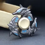 A detailed dragon-themed fidget spinner featuring a sleek black and blue design, perfect for stress relief and focus.