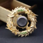 A metallic dragon-shaped fidget spinner with intricate detailing, designed for stress relief, focus, and sensory play.